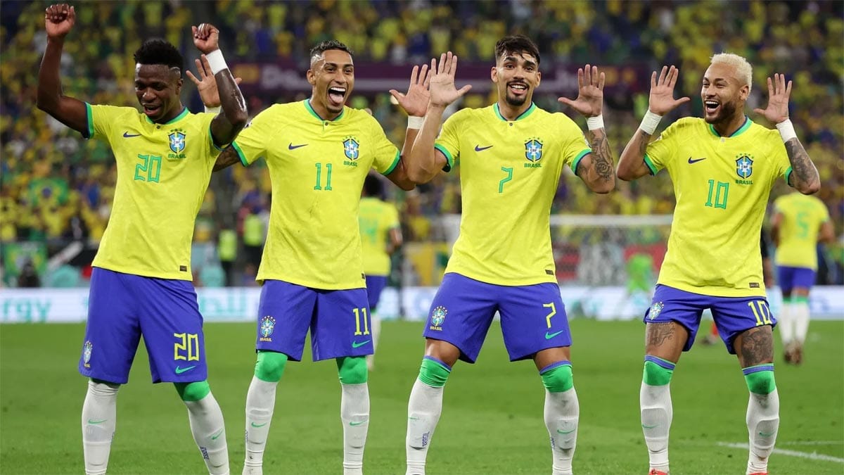 Brazil football team celebrating after winning a world cup match.