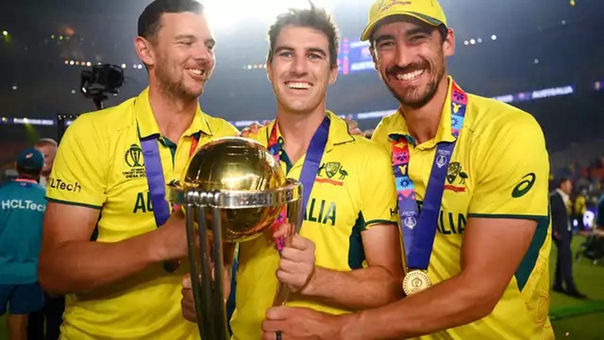 Mitchell Starc, Pat Cummins, and Josh Hazlewood celebrating for Australia.