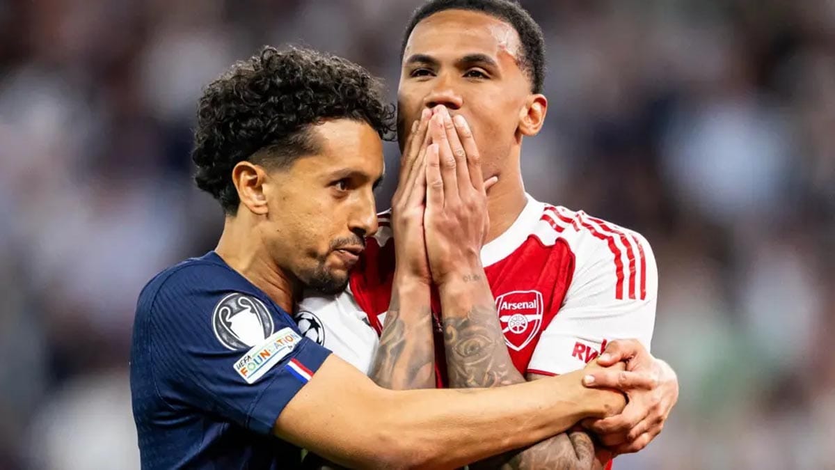 Marquinhos consoling his crying Brazil teammate Gabriel after the penalty shootout.
