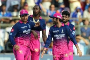 Jofra Archer celebrating after taking a crucial wicket against Mumbai Indians at Wankhede Stadium.