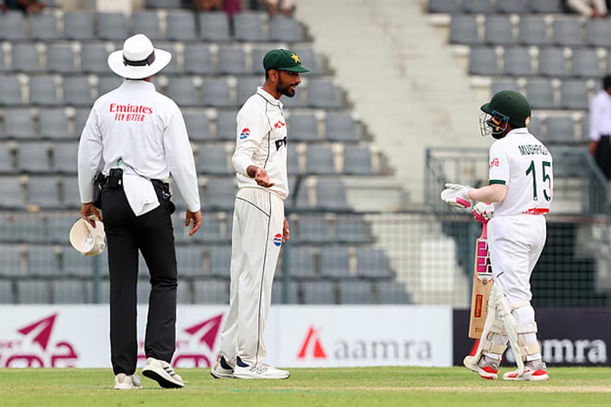 Pakistan captain Shan Masood talking to Mushfiqur Rahim in Sylhet.