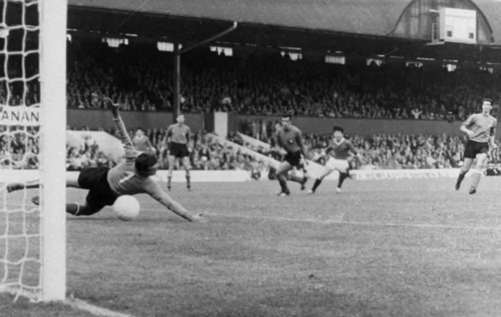 North Korea’s midfielder Pak Doo Ik, second right, shoots past Italian goalkeeper Enrico Albertosi in FIFA World Cup 1966.