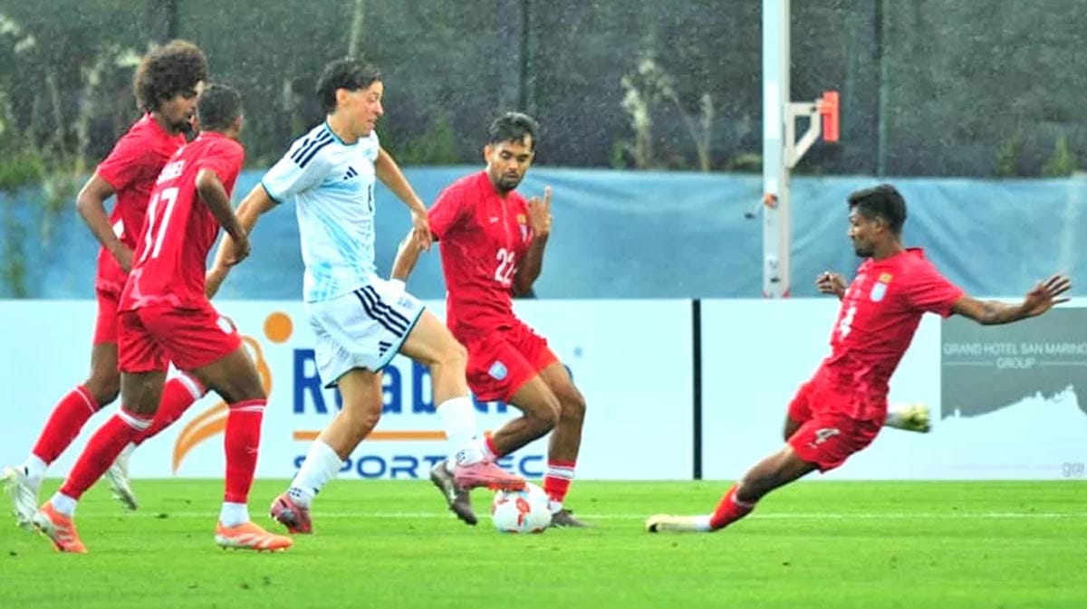 Bangladesh national football team player Topu Barman trying to take a shot against San Marino.