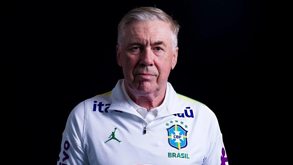 Carlo Ancelotti posing for a portrait wearing Brazil football team jersy.