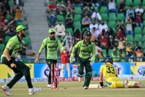 Shaheen Shah Afridi celebrating with his teammates after falling a wicket.