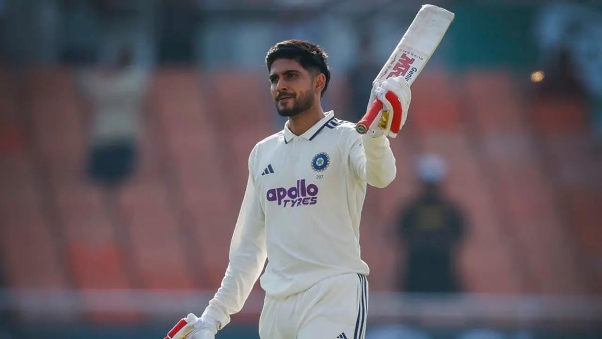 Indian captain Shubman Gill raising his bat to celebrate his 11th Test century at New Chandigarh.