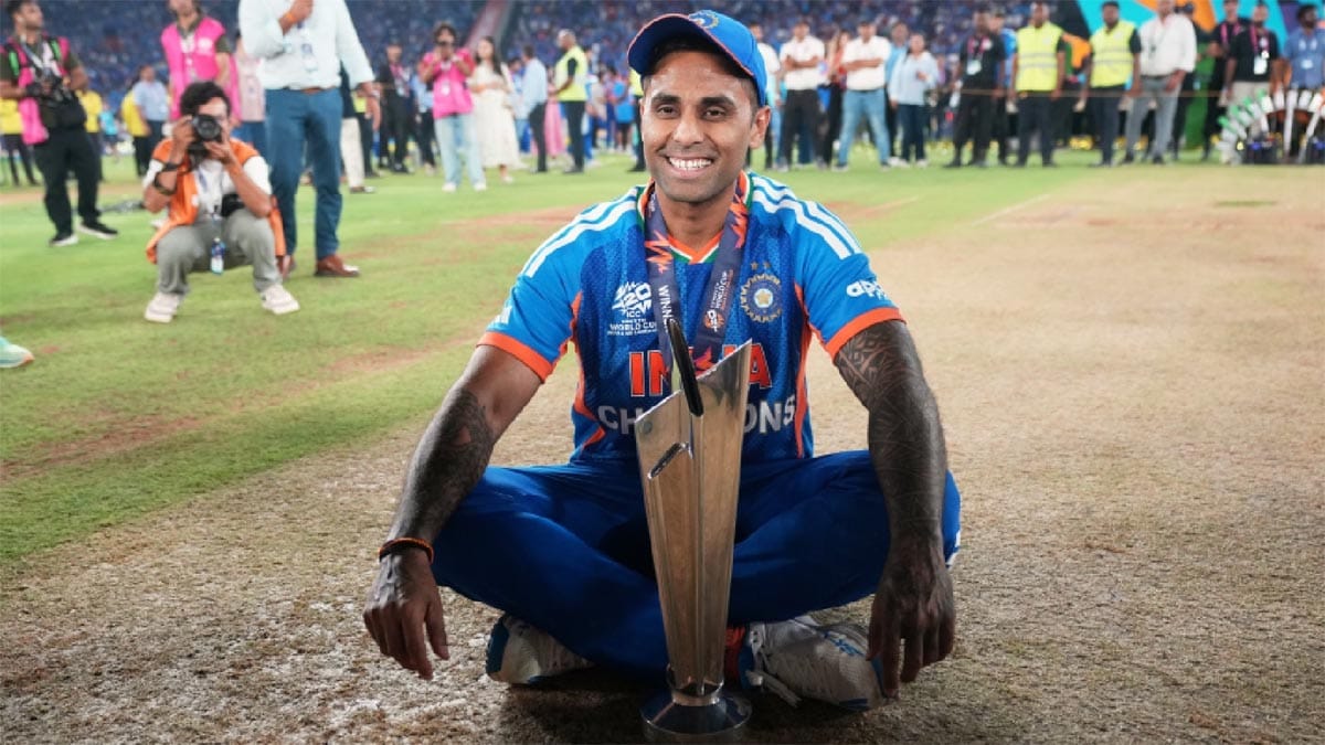 uryakumar Yadav holding the T20 World Cup 2026 trophy aloft after winning the final.